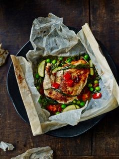 Chicken supremes in lovage butter en papillote