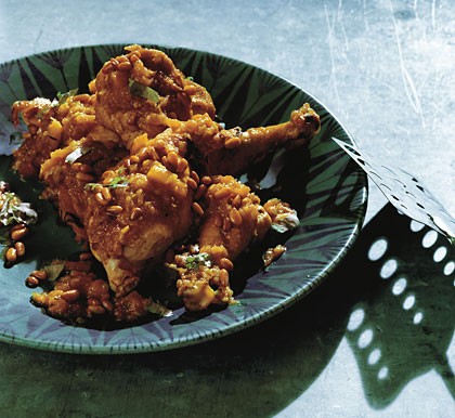 Chicken tagine with apricots and spiced pine nuts