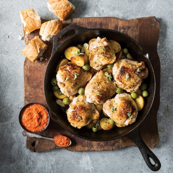 Chicken thighs with pimiento-pecan sauce