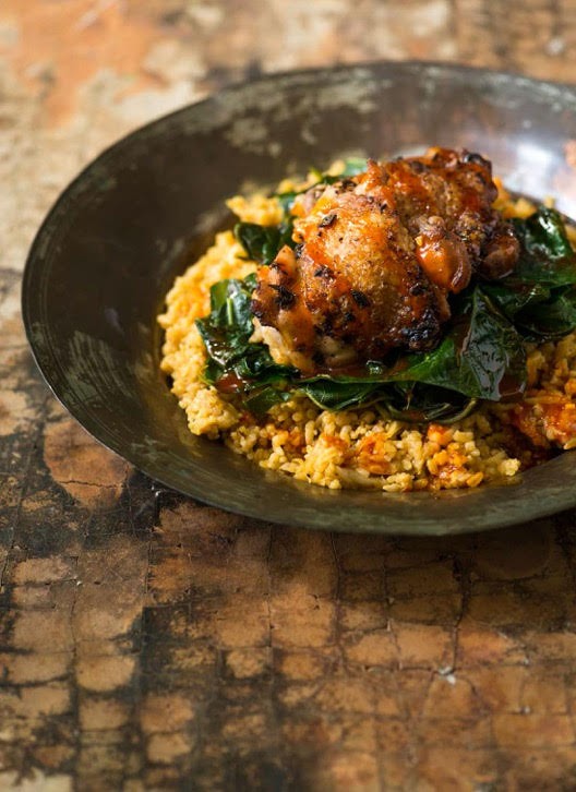 Chicken thighs with red palm-coconut rice