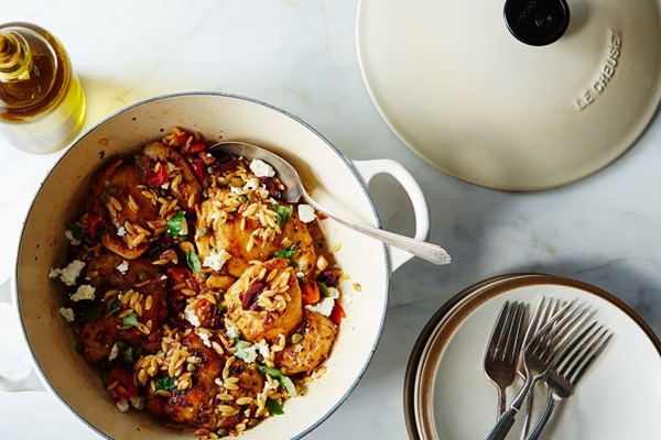 Chicken thighs with tomato, orzo, olives, and feta