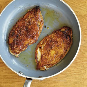 Chicken under a brick