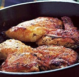 Chicken under a brick