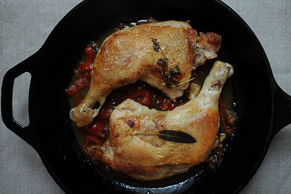 Chicken under a brick with pickled peppers