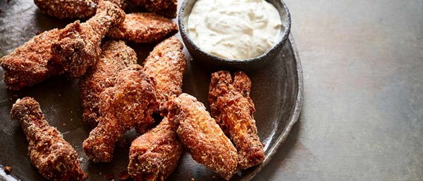 Chicken wings fried in instant mash