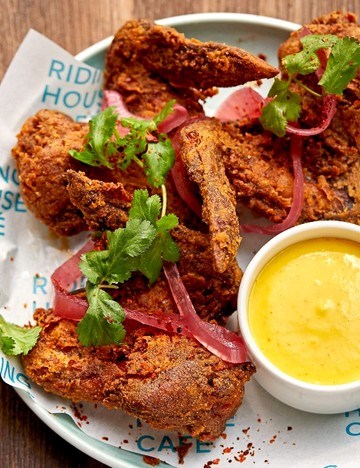 Chicken wings with Bajan pepper sauce and pickled onions
