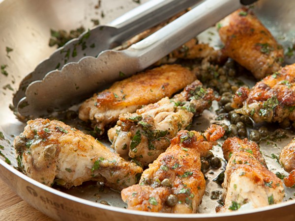 Chicken wings with brown butter-and-spinach sauce