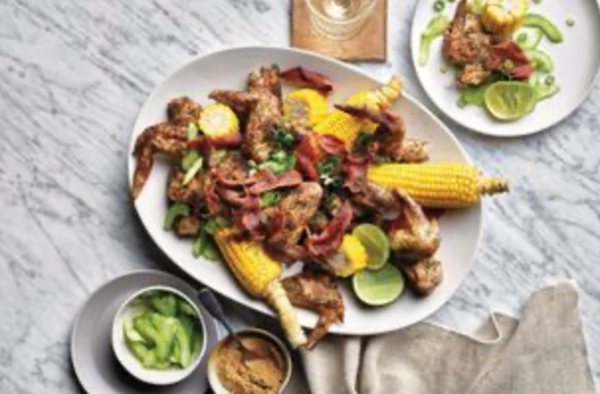 Chicken wings with homemade chicken salt, corn and pickled celery