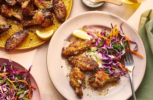 Chicken wings with lemon butter sauce & red cabbage slaw