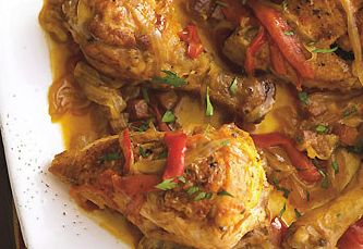 Chicken with bell peppers, smoked ham, and paprika