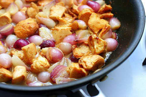Chicken with chanterelles and pearl onions
