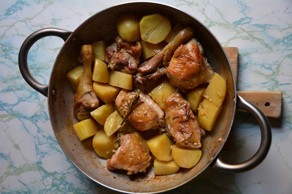 Chicken with potatoes, anchovy, rosemary and lemon