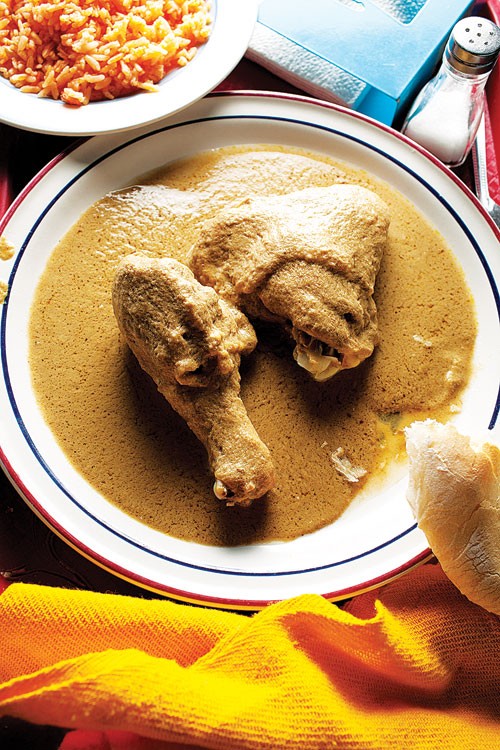 Chicken with pumpkin seed-tomatillo sauce (Pollo en pipián verde)