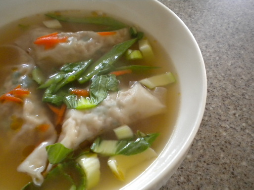 Chicken wontons in a ginger soy broth