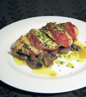 Chicken wrapped in bacon in cider vinegar dressing