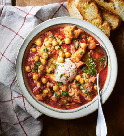 Chickpea and chorizo soup with fried bread and eggs