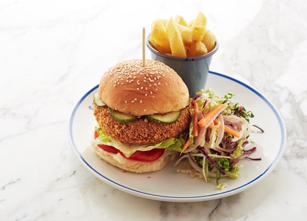 Chickpea and coriander veggie burger with chips and coleslaw