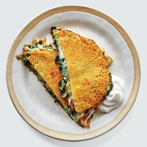 Chickpea pancakes with greens and cheese