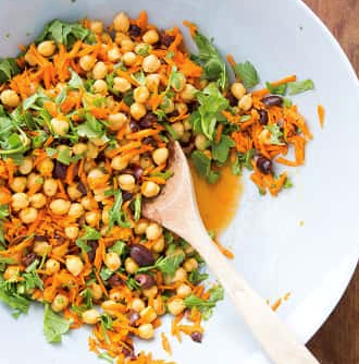 Chickpea salad with carrots, arugula, and olives