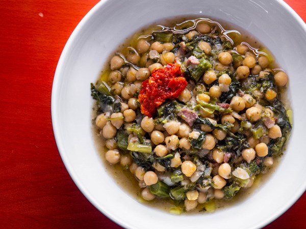 Chickpea stew with bacon and broccoli rabe