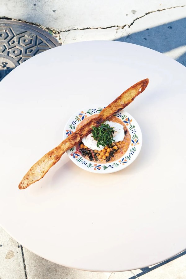 Chickpea stew with chard, poached eggs, and smoked chile