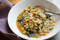 Chickpea stew with orzo and mustard greens
