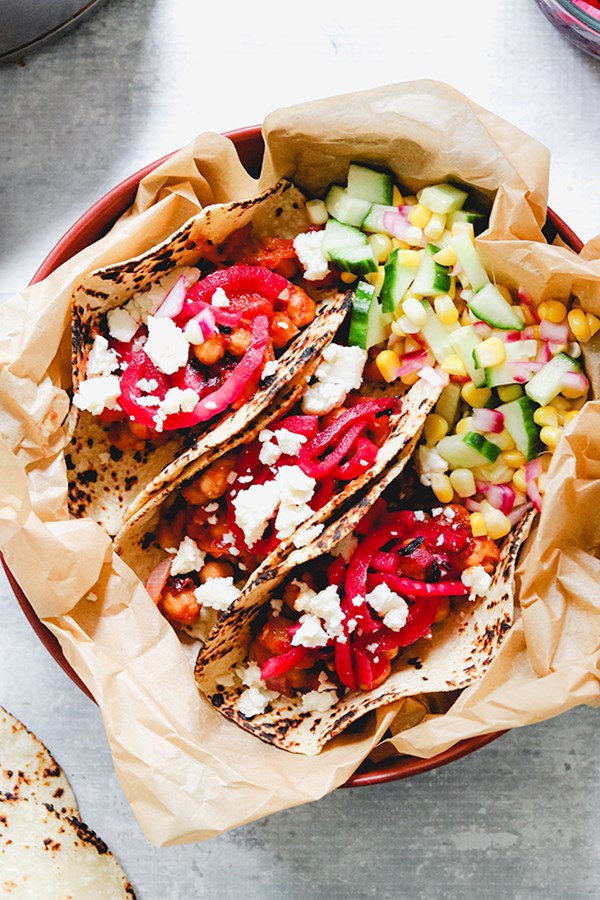 Chickpea tinga tacos with hibiscus-pickled onions and queso fresco