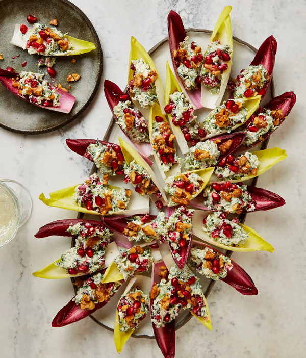 Chicory boats with feta, walnut and pomegranate