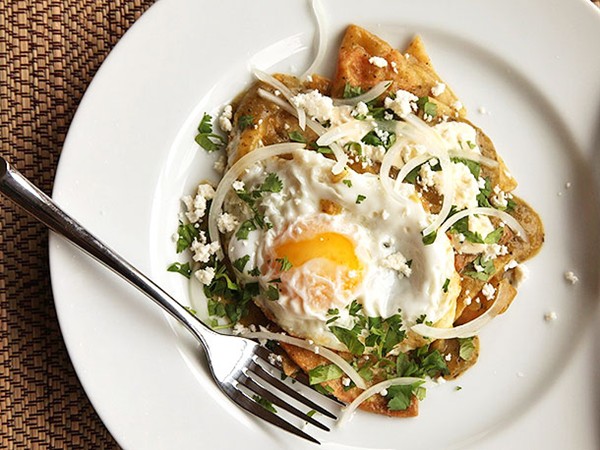 Chilaquiles verdes with fried eggs