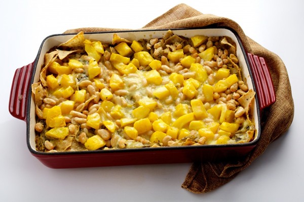 Chilaquiles verdes with squash and white beans