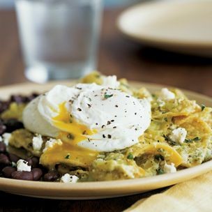 Chilaquiles with poached eggs and black beans