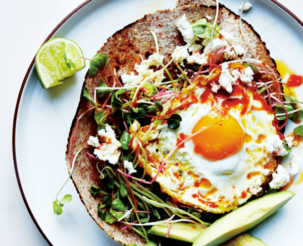 Chile-and-olive-oil-fried egg with avocado and sprouts