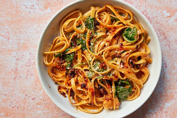 Chile crisp fettuccini Alfredo with spinach [Genevieve Ko]