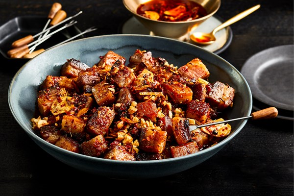 Chile crisp-glazed bacon bites