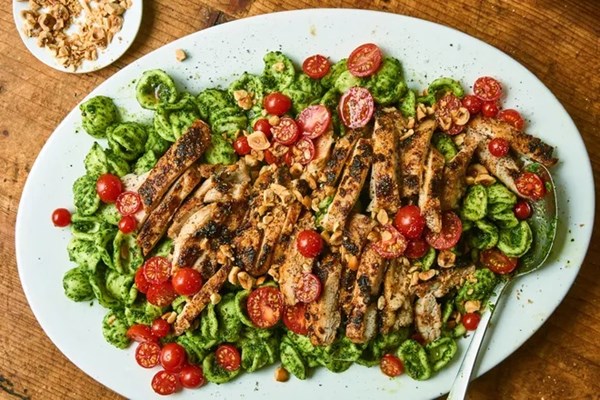 Chile-garlic chicken with spinach pesto pasta