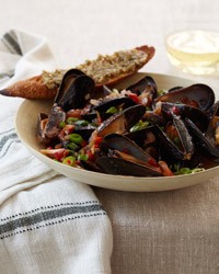 Chile-steamed mussels with green olive crostini