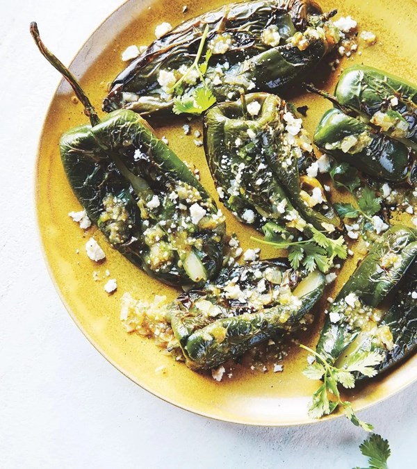 Chiles rellenos with charred green enchilada sauce
