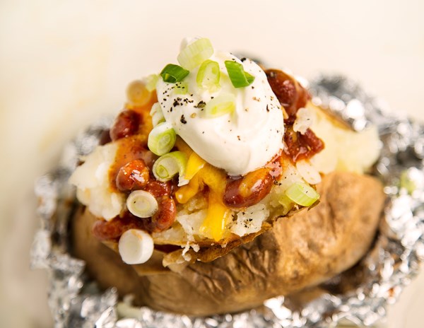 Chili and cheese stuffed baked potatoes