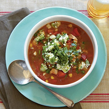 Chili-spiced chicken soup with spotlight peppers and avocado relish