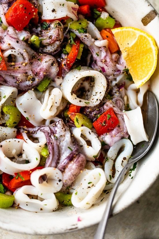Chilled calamari salad with lemon and parsley