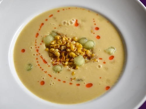 Chilled corn soup with chile oil and honeydew