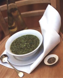 Chilled green soup with olives