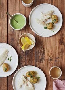 Chilled halibut with a cold green herb sauce (Dampet hellefisk serveret kold med grønsovs)