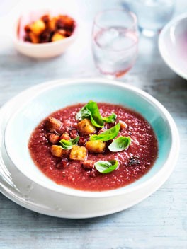 Chilled melon gazpacho with young basil leaves, speck and croûtons
