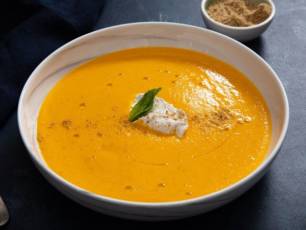 Chilled minty carrot soup with dukkah yogurt