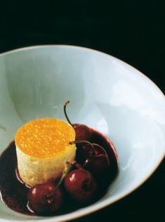 Chilled rice pudding with cherry soup