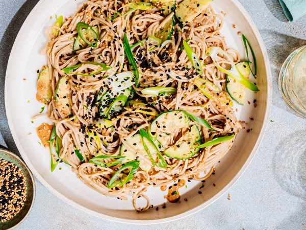 Chilled sesame soba bowl with cucumber and scallions