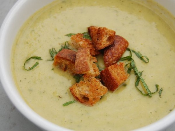 Chilled summer squash soup with yogurt, mint, and sourdough croutons