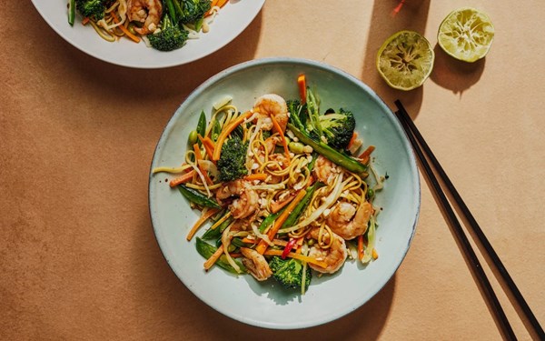 Chilli and ginger prawn stir-fry with crisp vegetables and noodles