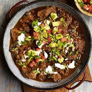 Chilli con carne with avocado and chilli salsa